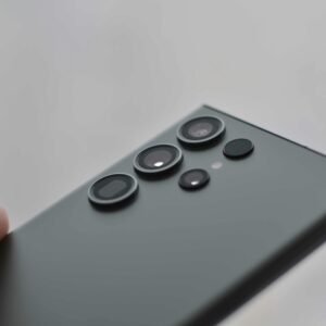 Detailed close-up of smartphone camera lenses, ideal for tech visuals.